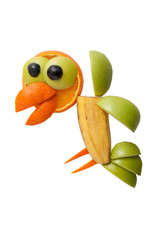 Flying crow made of banana, apple and orange