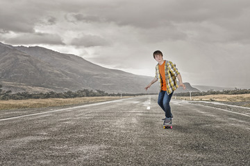 Boy ride skateboard