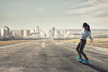 Girl ride skateboard