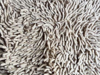 Old dirty doormat for clean and wipe foot. Background texture