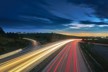 Fototapeta na wymiar Long-exposure sunset over a highway