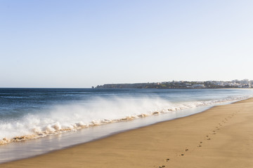 Obraz premium Wellen am Sandstrand