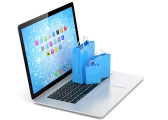 laptop and  shopping pags on white background. 3d rendering.