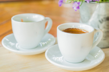 espresso coffee cup on wooden table ,soft focus