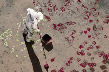 Young Seaman Painting His Ship