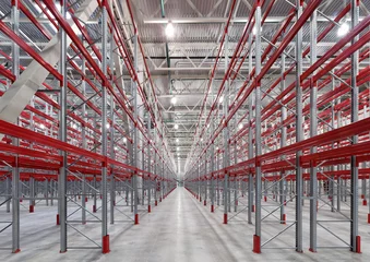 Poster de jardin Bâtiment industriel  Industrial racks pallets shelves in huge empty warehouse interior.  Storage equipment.