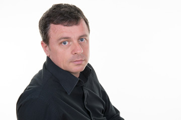 Serious thoughtful man on a white background