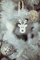 toy reindeer on Christmas tree