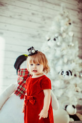 Girl and snowman in the background