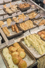 Traditional Japanese food selling in Nishiki Market in Kyoto city, Japan