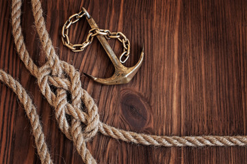 Sailor knot and brass anchor