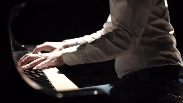 a Man Playing the Piano