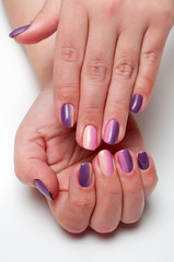 Fototapeta premium purple pink and beige manicure with a gradient