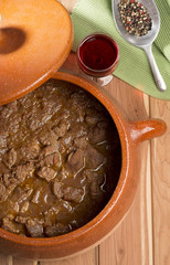meat with pepper in the pot