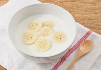Bowl of Homemade Yoghurt with Ripe Banana
