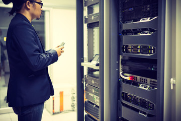 Man fix server network in data center room