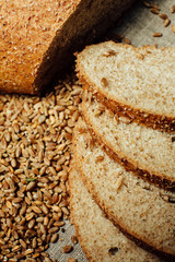 Assortment of baked bread on wood table