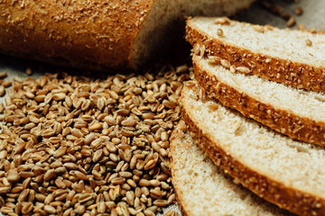 Assortment of baked bread on wood table