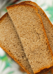 sliced of baked brown bread