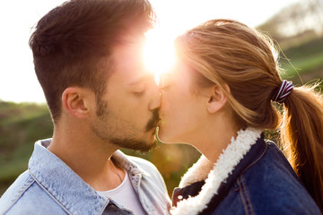 Fototapeta premium Beautiful young couple in love in the park.