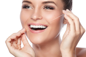 Woman and dental floss
