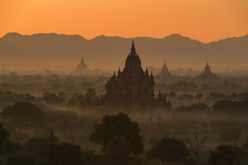 group of ancient pagodas at the scenic sunrise at bagan myanmar