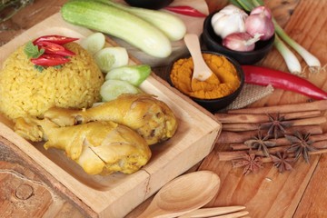 Obraz na płótnie Canvas Chicken biryani with rice delicious and sauce.