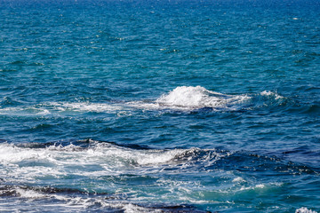 Small white wave in Mediterranean Sea