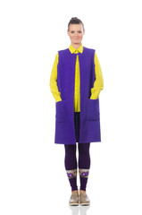 Pretty caucasian model in purple vest isolated on white