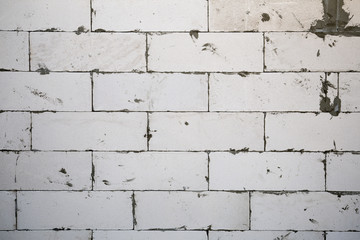 Unfinished White Brick Wall
