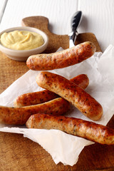 Spicy grilled sausages with a mustard sauce