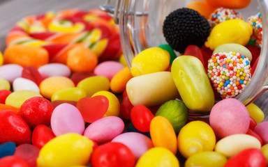 Fototapeta na wymiar Closeup colorful candies in jar