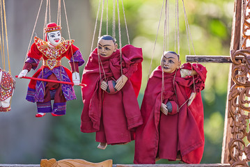 Traditional handicraft puppets are sold in a market in Bagan, Myanmar
