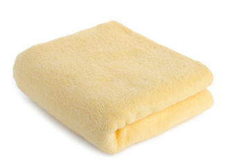 Fototapeta na wymiar one yellow towel isolated on white