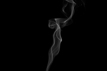 Abstract gray smoke from the incense sticks.