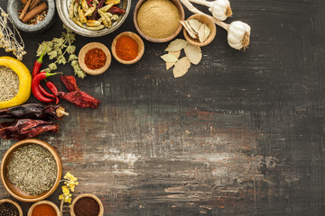 Various spices on vintage board