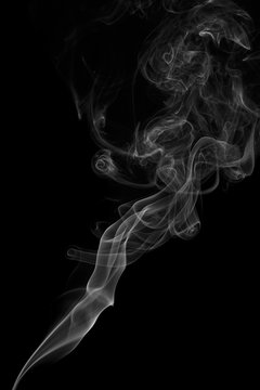Abstract gray smoke from the incense sticks.