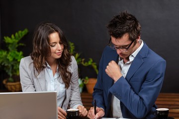 Business people working with laptop and coffee