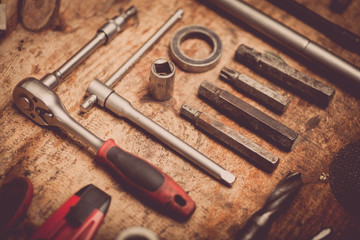 Tools on wooden plank