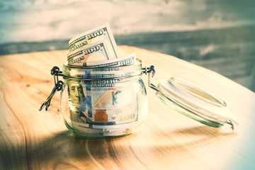 Jar with dollars