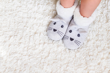 Child. Child's feet in slippers