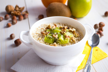 oatmeal with nuts and fruits for breakfast