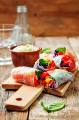 rainbow spring rolls with avocado white bean hummus