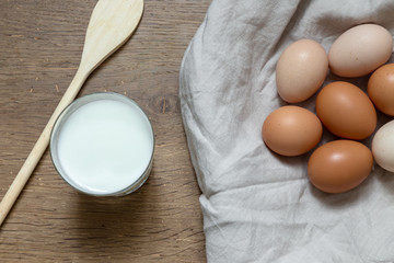 Eggs and wooden spoon