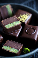 Chocolate candy with pistachio marzipan 