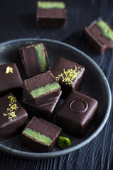 Chocolate candy with pistachio marzipan 