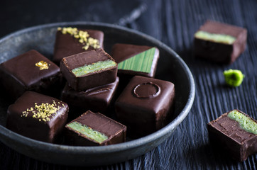 Chocolate candy with pistachio marzipan 