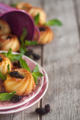 Cakes with mulberry background