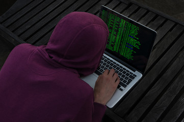 Hacker in front of his laptop