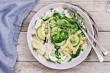 Pasta with broccoli,zucchini and green pea.Selective focus 